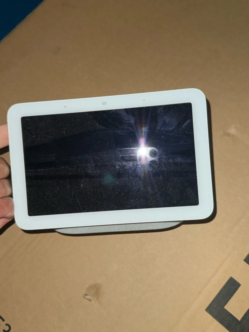 google Nest Hub smart display in white and light gray